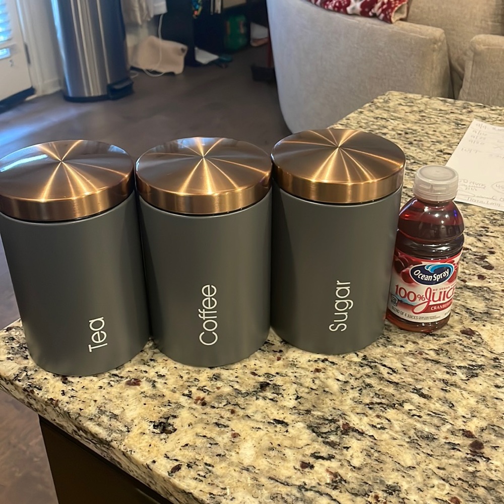 Brand new canisters. Great for a dark kitchen.